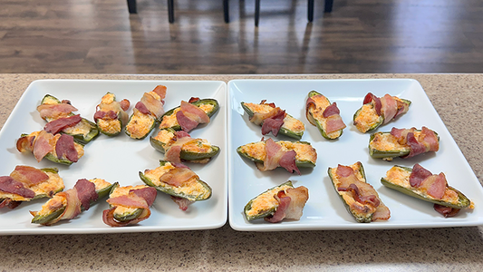 Cooked Bacon-Wrapped Jalapeño Poppers on Square White Plates