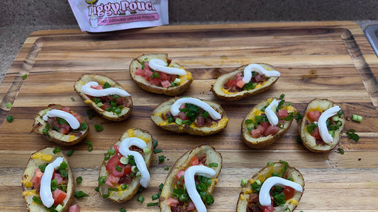 Crispy potato skins on a cutting board with a Piggy Pouch of leftover bacon grease in the background.